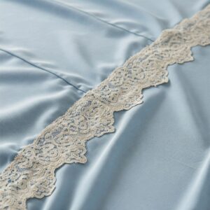 A classic quilted bed jacket laid flat, displaying its design and shape.