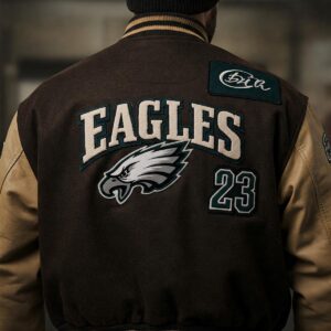 The back of an eagles varsity jacket featuring potential team logos or personalized elements.