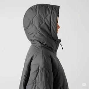 Side profile of a practical hooded quilted jacket, highlighting the cozy hood and comfortable fit, perfect for added protection against the elements.