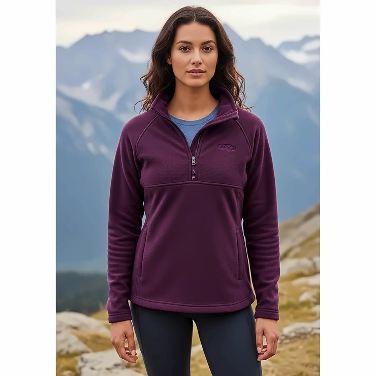 Stylish womens half-zip microfleece jacket in purple, perfect for easy layering and temperature regulation during outdoor activities.