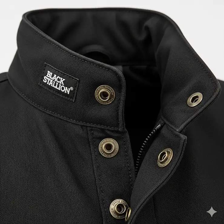 Close-up shot of the collar and front snaps on a new Black Stallion welding jacket.