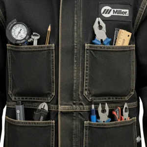 Close-up of the front pockets on the Miller welding jacket, showing ample storage for tools.
