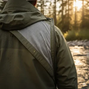 Showing the breathable back panel and mesh lining, highlighting the moisture-wicking technology in the men's wading jacket.