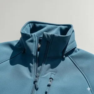 The high collar of the soft shell jacket for women, showing the soft fleece lining for extra warmth.