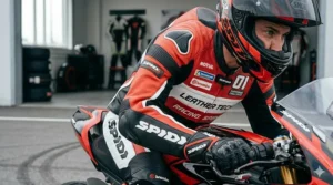 Illustration of the pre-curved sleeve design on a replica MotoGP jacket for a natural racing tuck position.